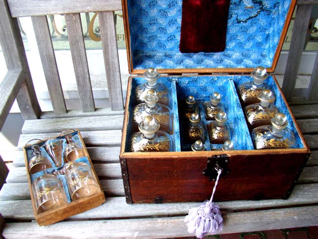 An important late 18th century iron bound oak travelling liquor chest belonging to Gen. Abraham Rose of Long Island having its original and complete set of gilded hand blown glass decanters(12), tumblers, funnel and wine glasses. Spanish circa 1790.  — image 2
